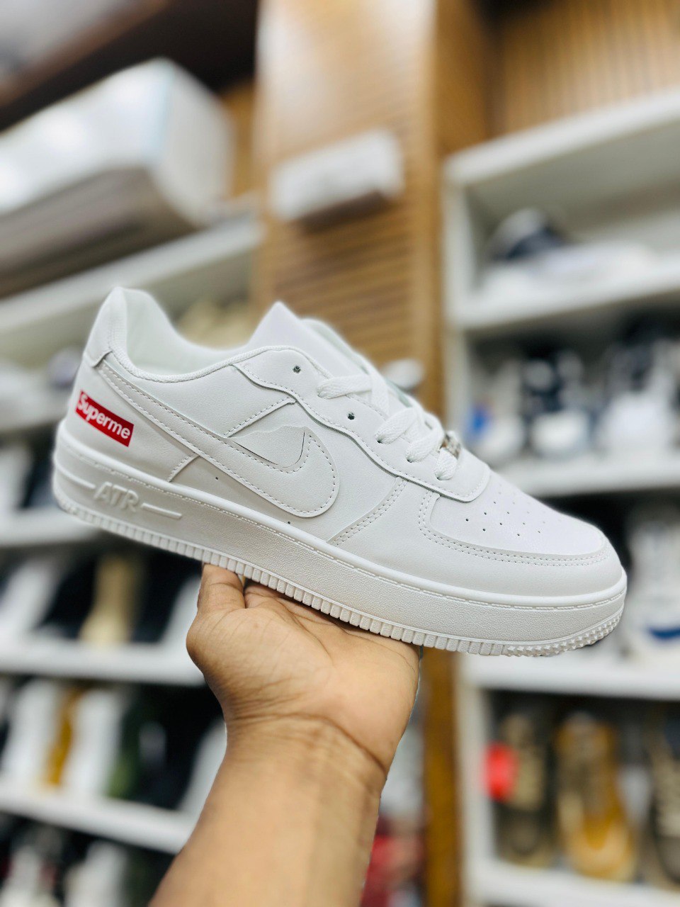 Nike x Supreme Low-Top Sneaker with Red Logo Accent -